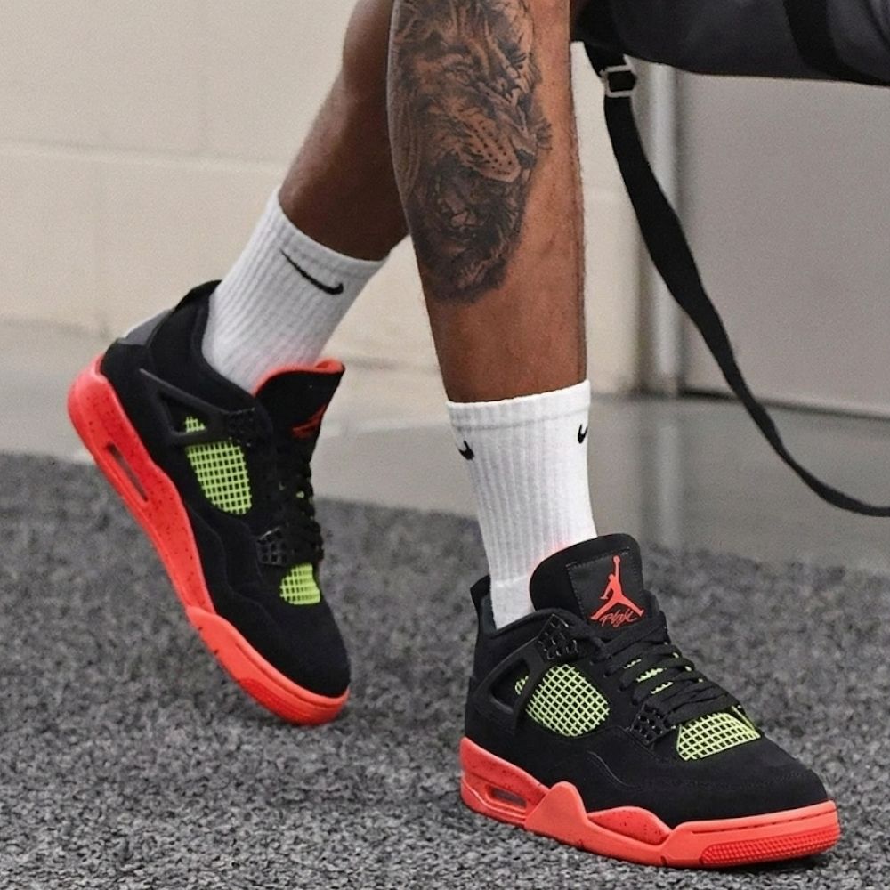 Black Infrared 23 - Air Jordan 4 Retro - product image from the listing.