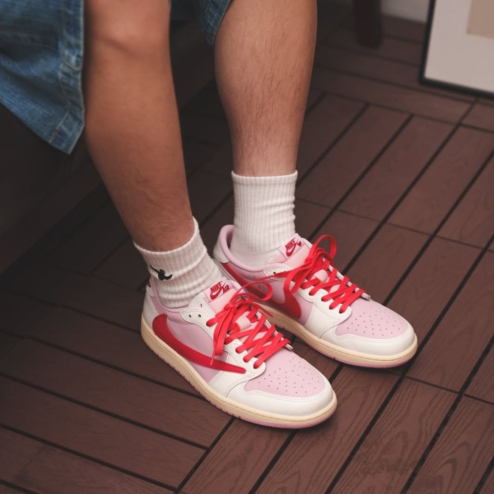 Air Jordan 1 Retro Low OG x Travis Scott Sail Tropical in Pink - product image from the listing.
