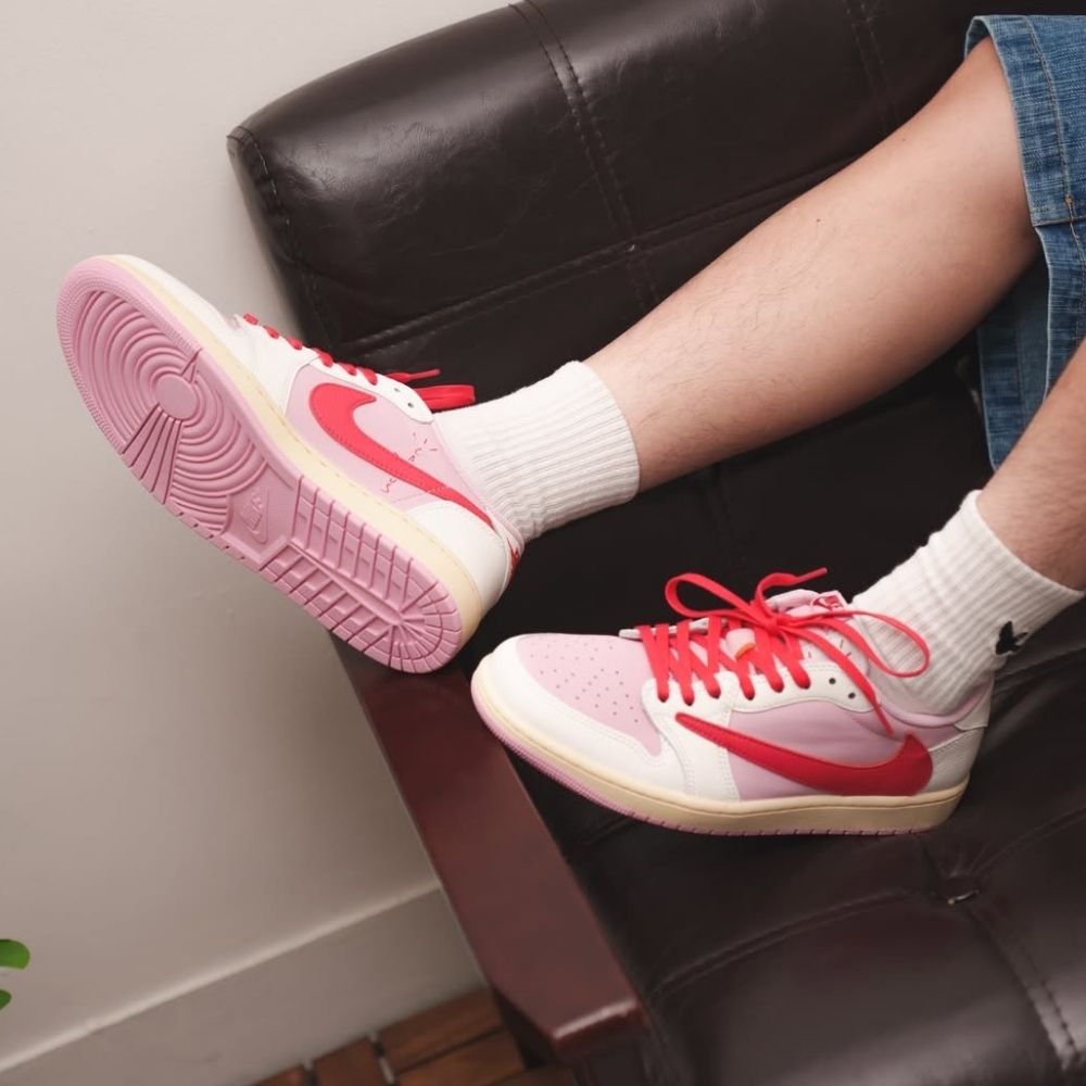 Air Jordan 1 Retro Low OG x Travis Scott Sail Tropical in Pink - product image from the listing.