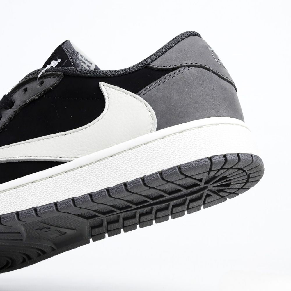 Air Jordan 1 Retro Low x Travis Scott in Grey Black - product image from the listing.