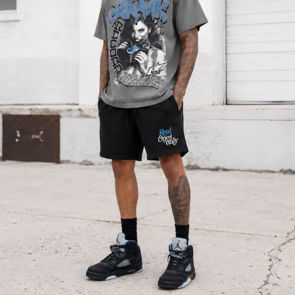 Air Jordan 5 Retro in Black University Blue - product image from the listing.