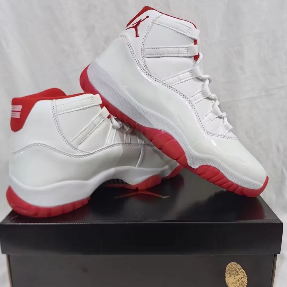 Varsity Red Bottom - Air Jordan 11 Retro - product image from the listing.