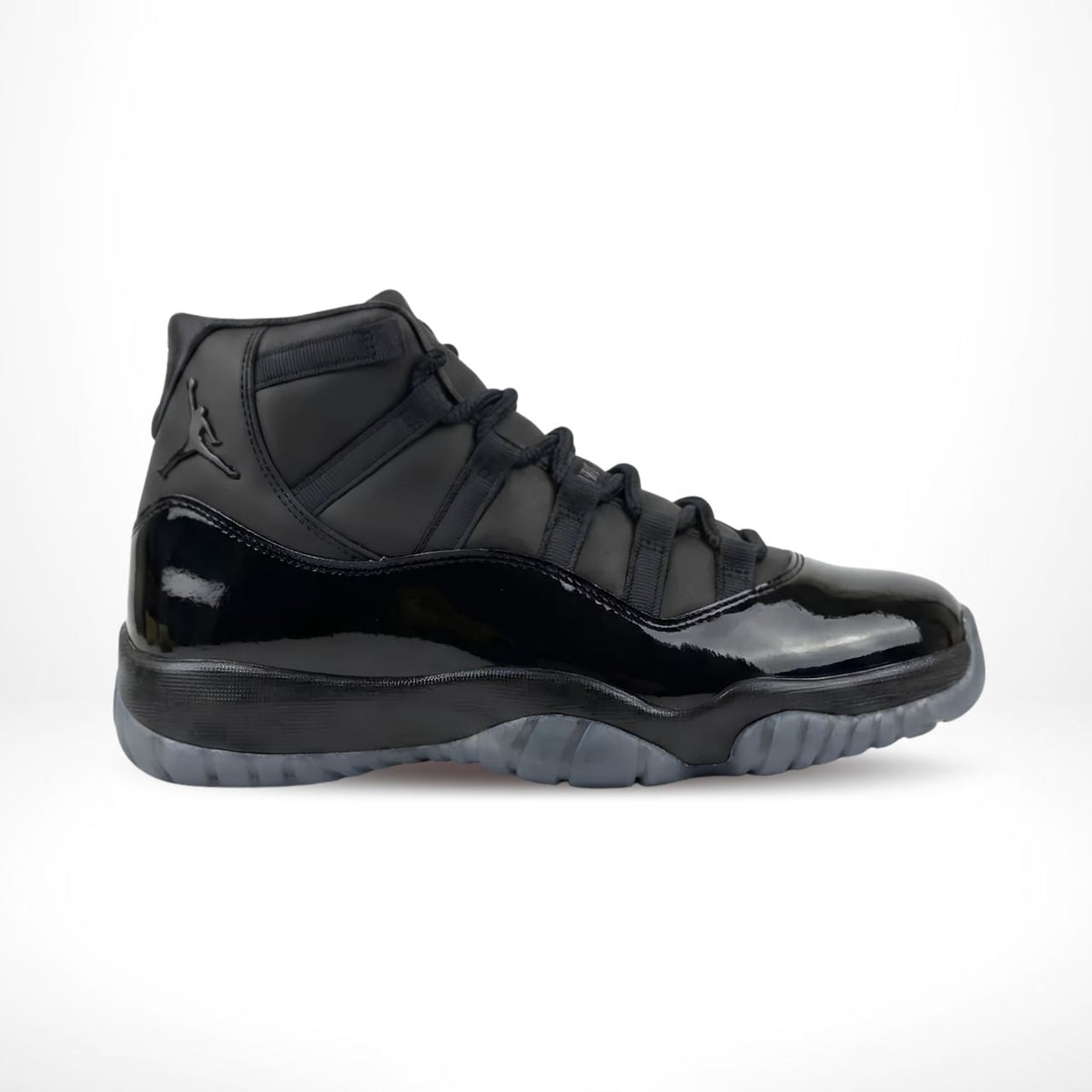 Air Jordan 11 Comme des Garçons Homme Plus in Black - product image from the listing.
