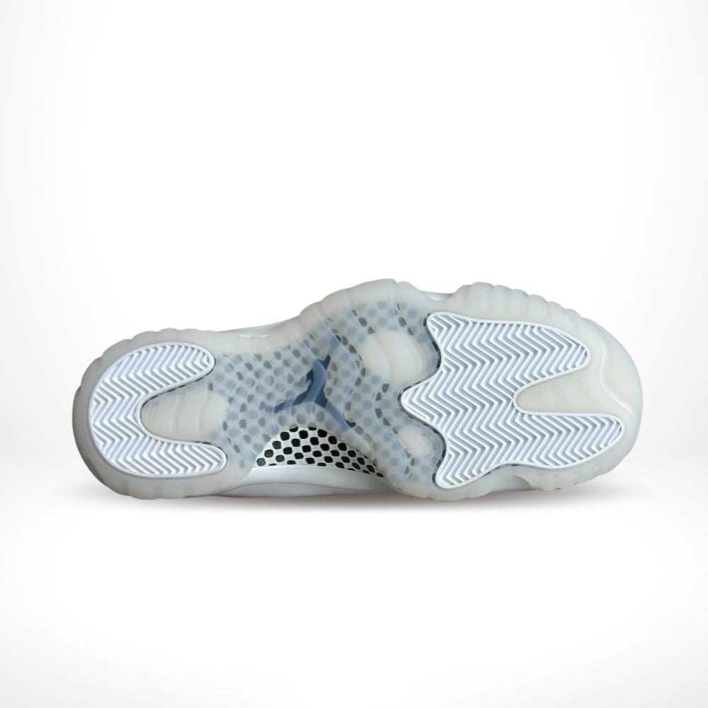 Air Jordan 11 Comme des Garçons Homme Plus in White - product image from the listing.