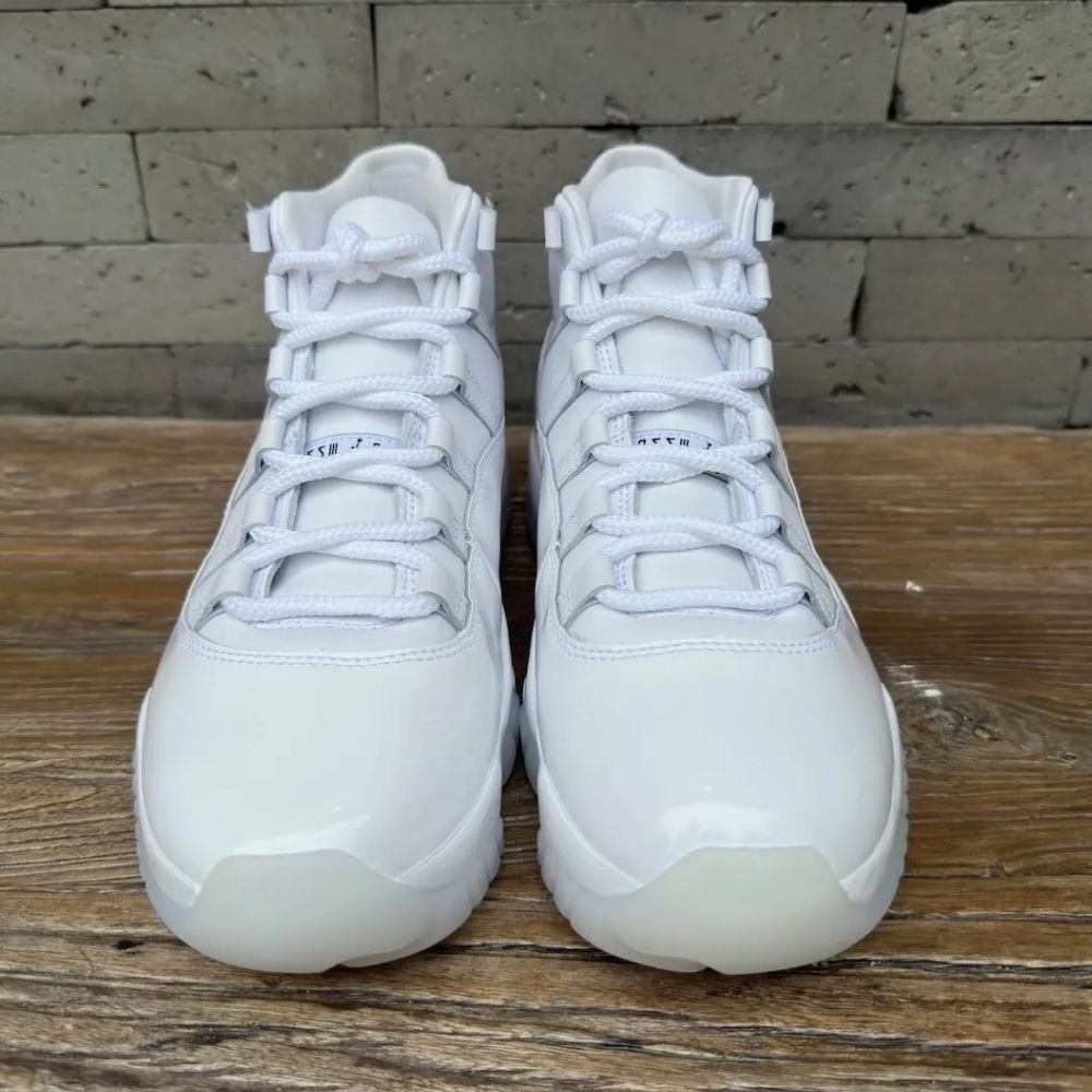 Air Jordan 11 Comme des Garçons Homme Plus in White - product image from the listing.