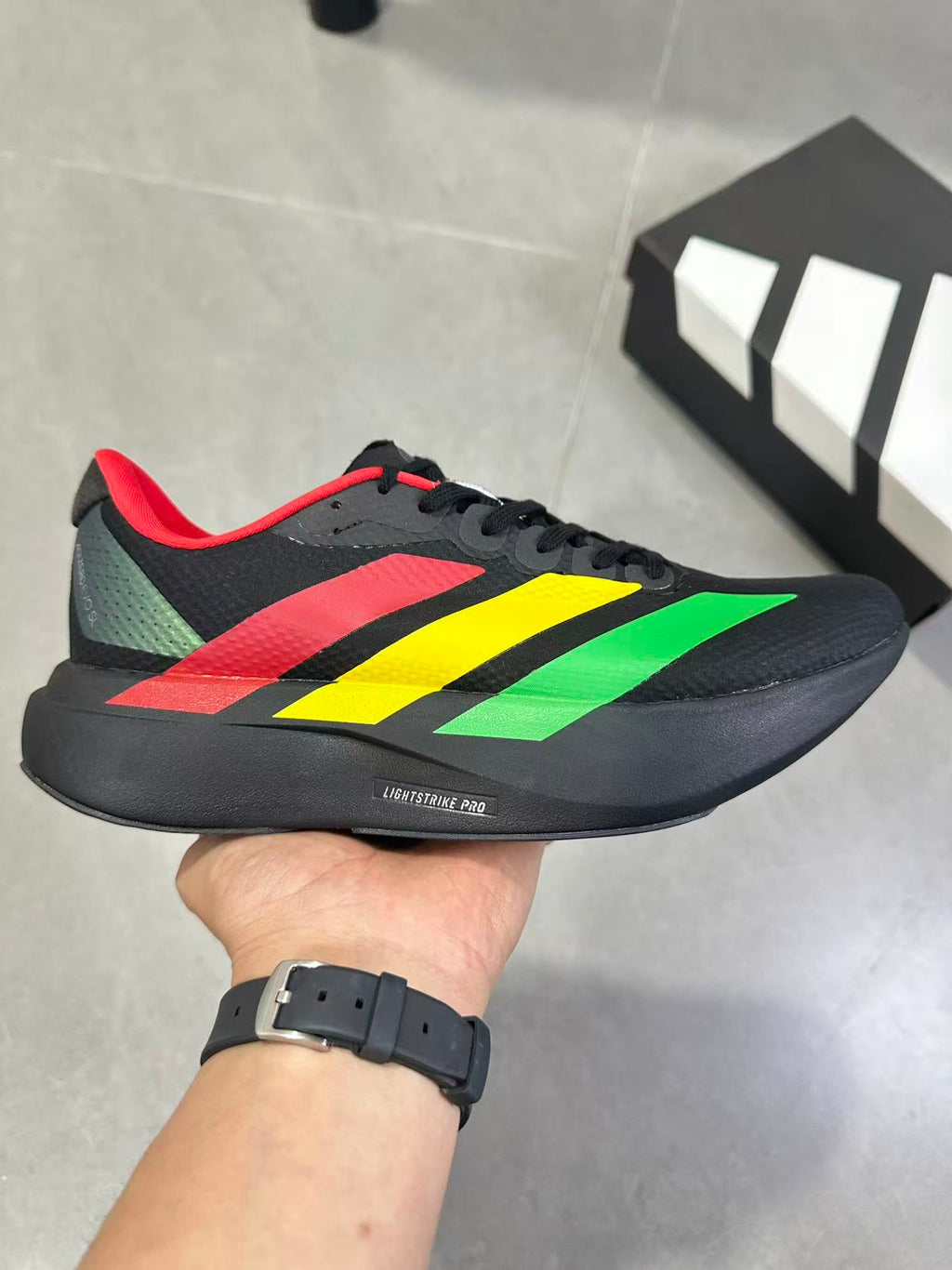 Adidas Lightstrike Pro Running Shoes, in Black Green Yellow Red KJ6160 - product image from the listing.