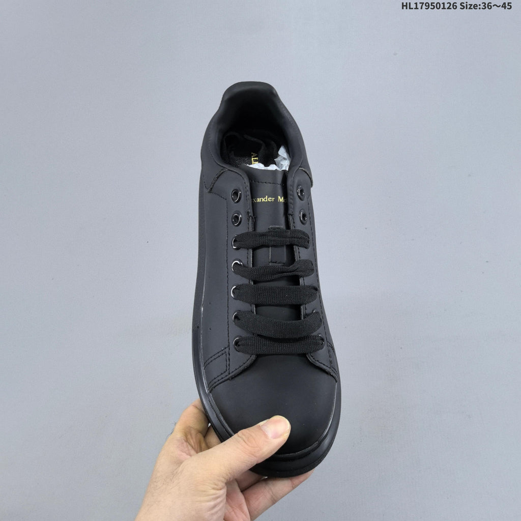 Alexander McQueen Low-Cut Sneakers in Black with Thick Sole - product image from the listing.