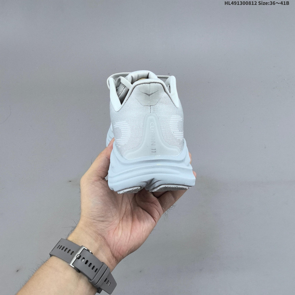 HOKA Clifton 11 Running Shoes in White - product image from the listing.