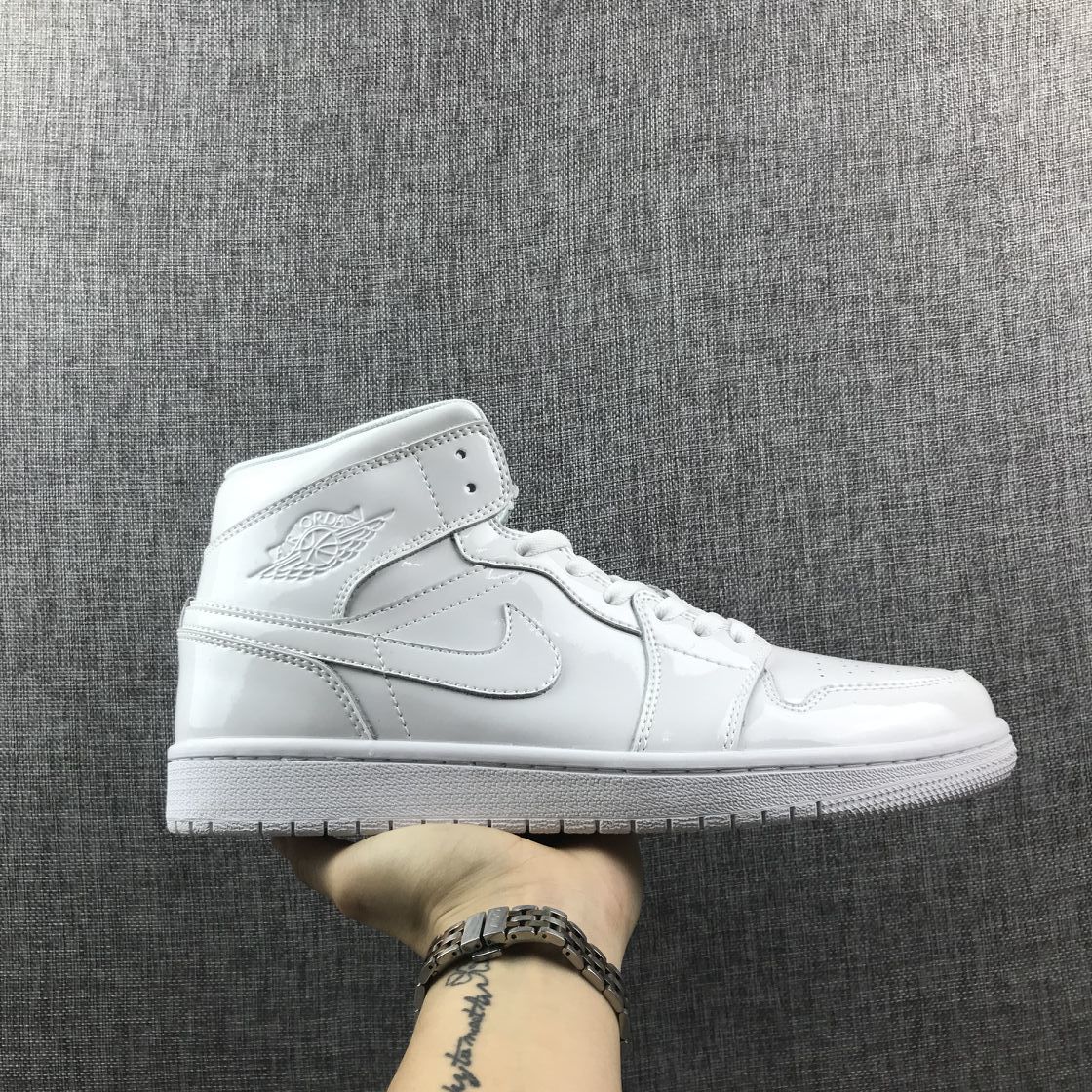 Air Jordan 1 Mid White Patent-Style Sneakers BQ6472-111 - product image from the listing.