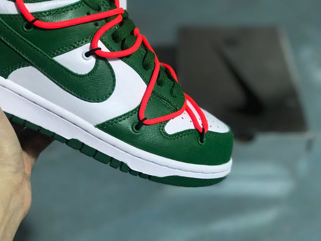 Nike Dunk Low White Pine Sneakers in Green CT0856-100 - product image from the listing.