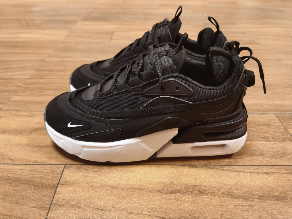 Nike Air Max Scorpion Sneakers in Black and White - product image from the listing.
