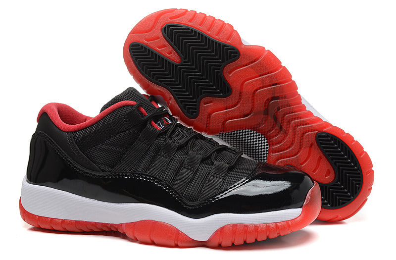 Air Jordan 11 Retro Low Black Red Sneakers - product image from the listing.