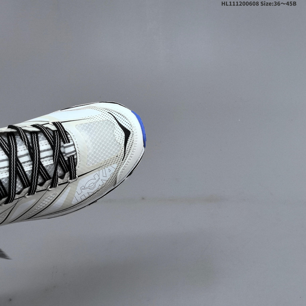 HOKA Mafate Speed 2 Low Trail Running Shoes, in White Black Blue - product image from the listing.