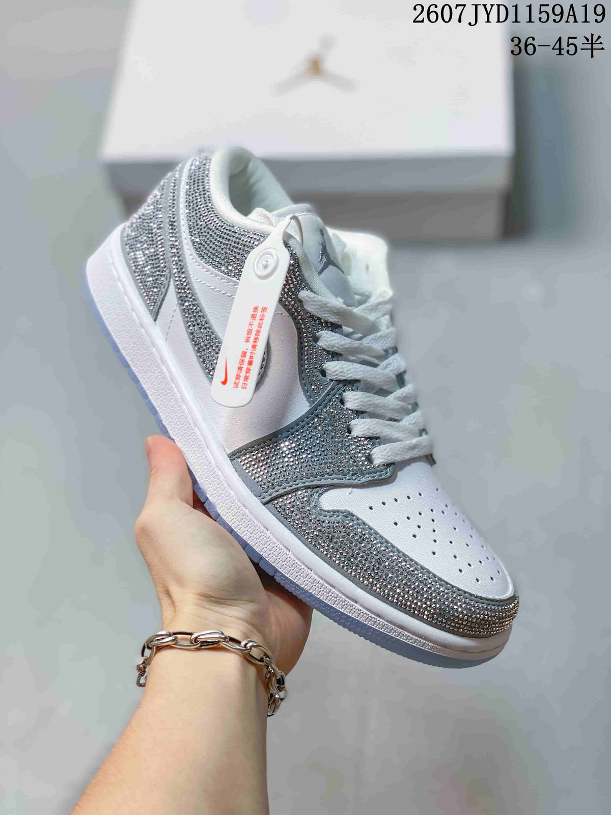 Air Jordan 1 Low Sneakers White Silver 2607JYD1159A19 - product image from the listing.