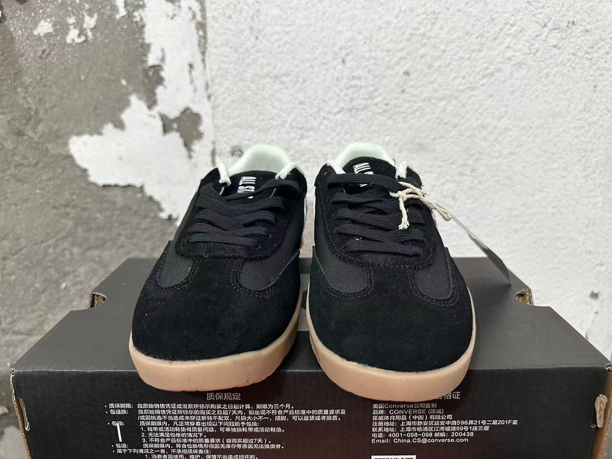 Black and White Converse Trainer-Style Sneakers - product image from the listing.