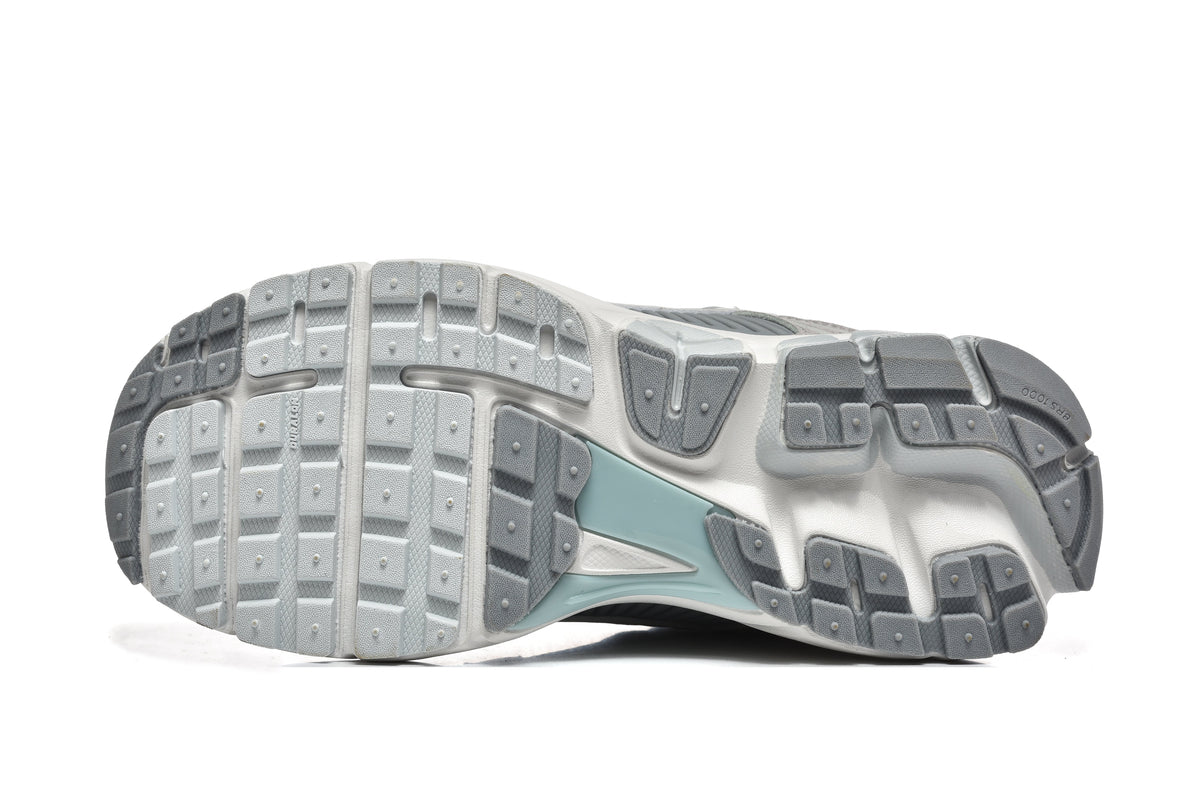 Grey and White Nike Vomero 5 Sneakers - product image from the listing.