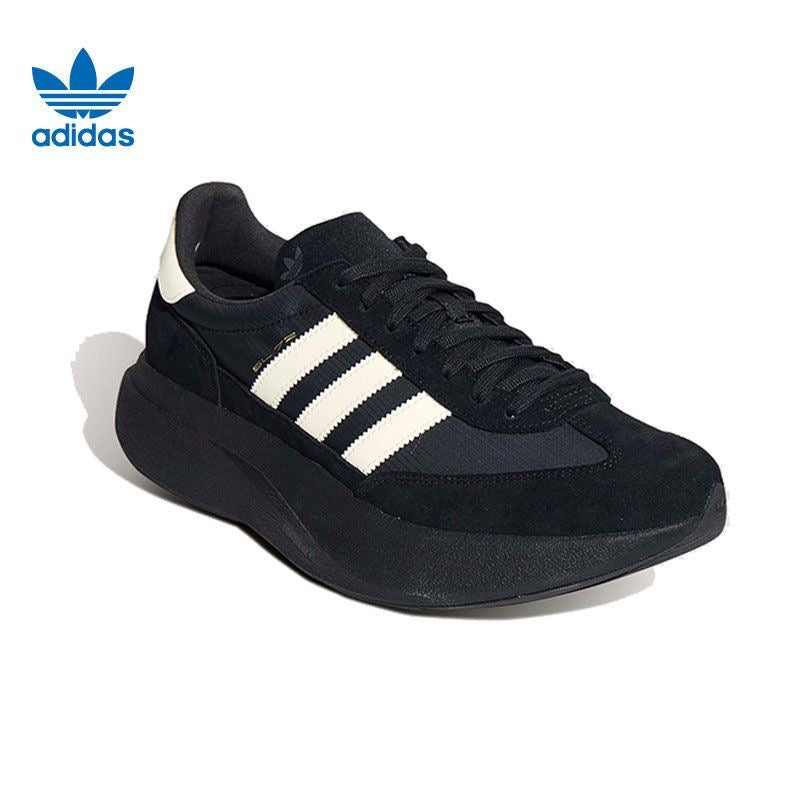 adidas Sneakers in Black and White - product image from the listing.