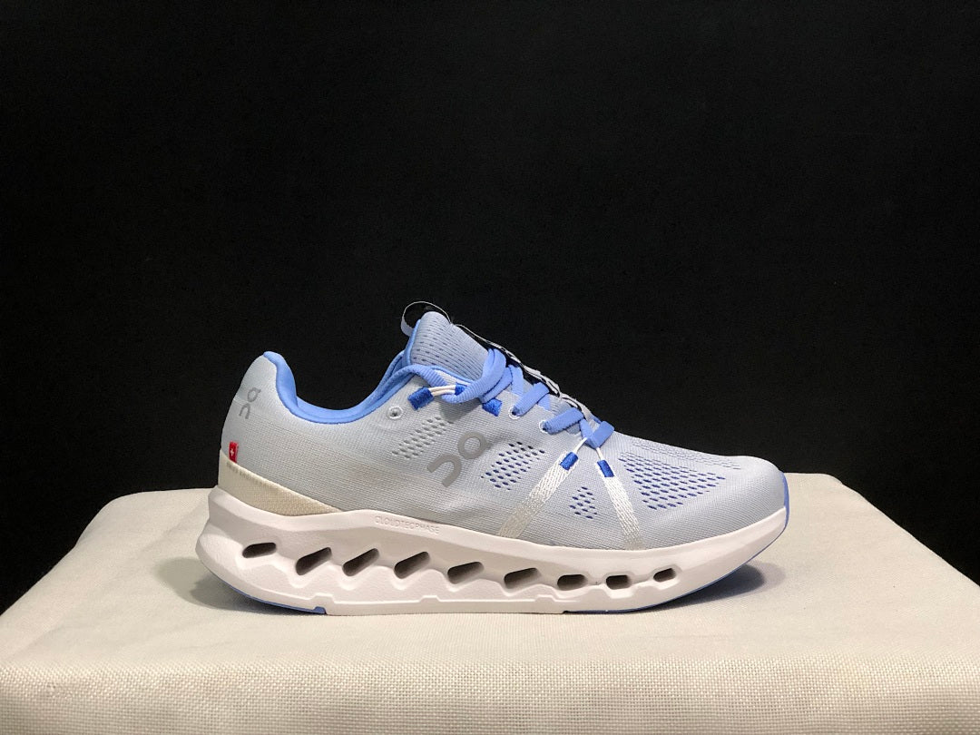 On Cloudsurfer Running Shoes, Heather in White and Blue - product image from the listing.