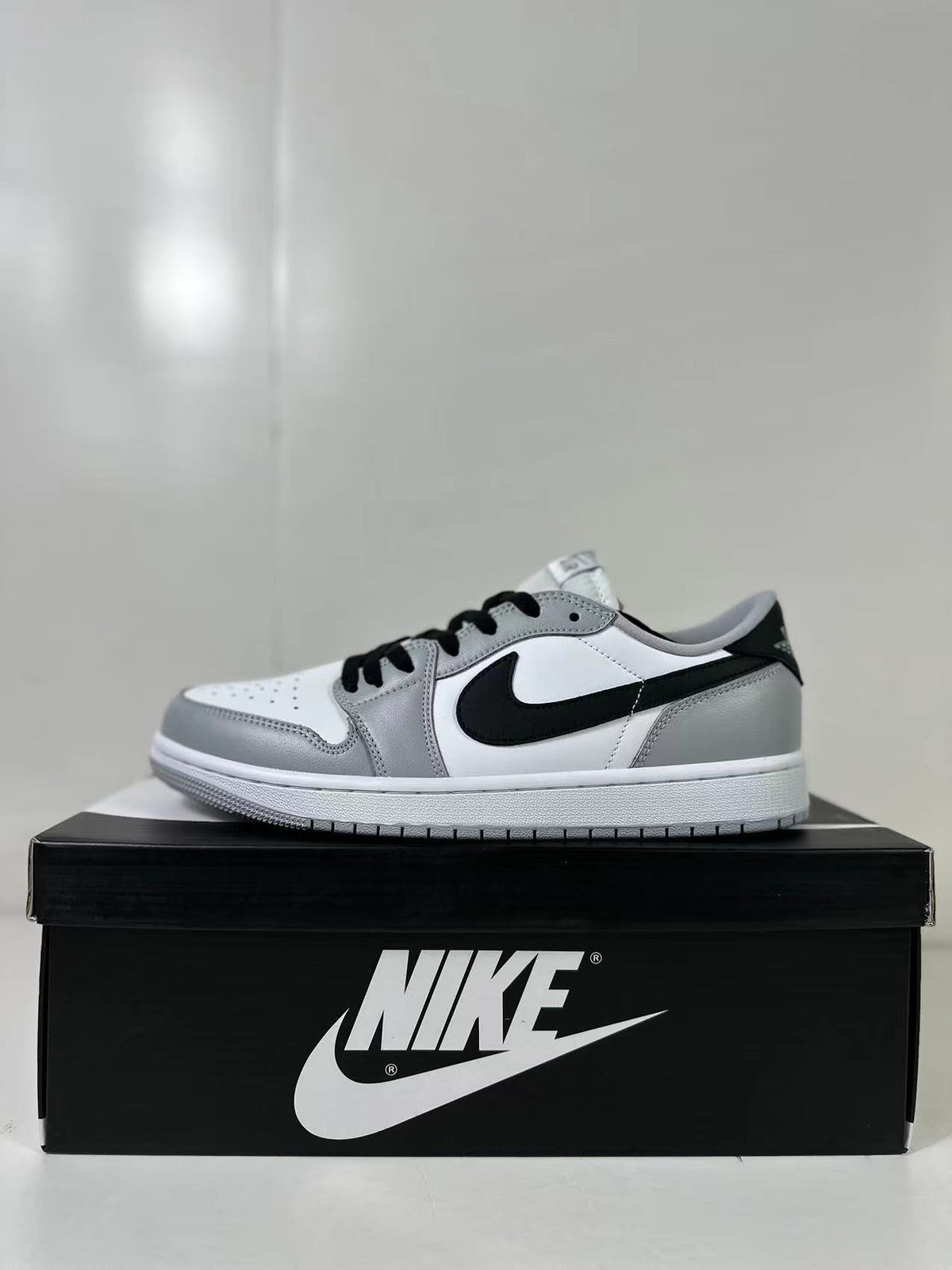 Air Jordan 1 Low OG Barons Sneakers Black Grey CZ0790-110 - product image from the listing.