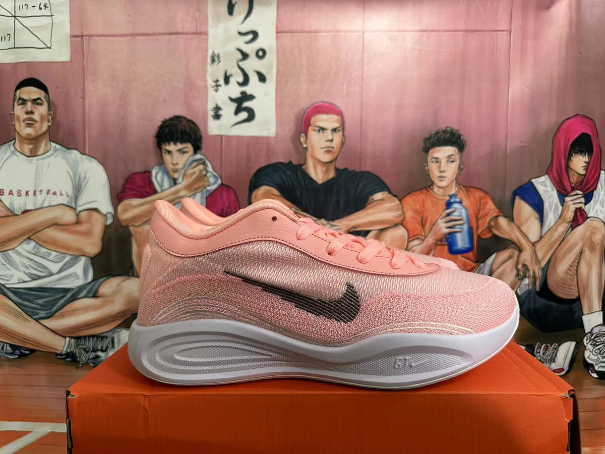Pink and White Nike Basketball Shoes - product image from the listing.