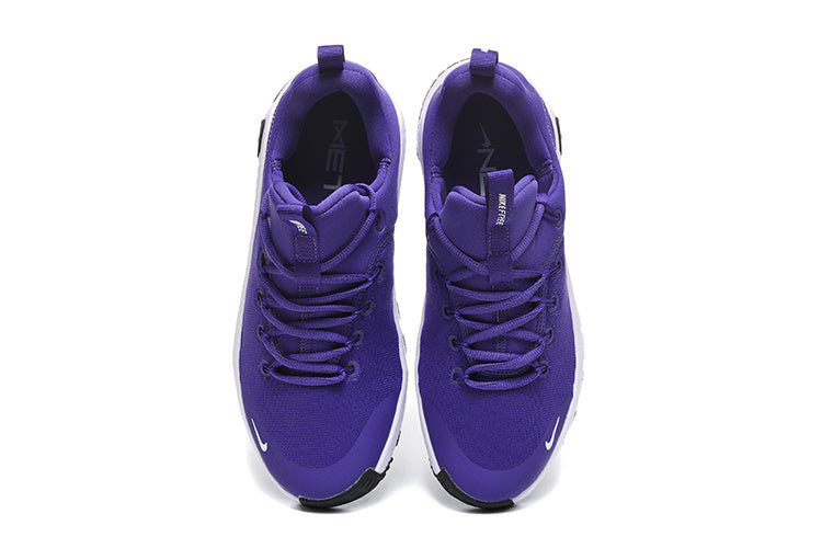 Nike Free Low-Top Sneakers in Purple - product image from the listing.