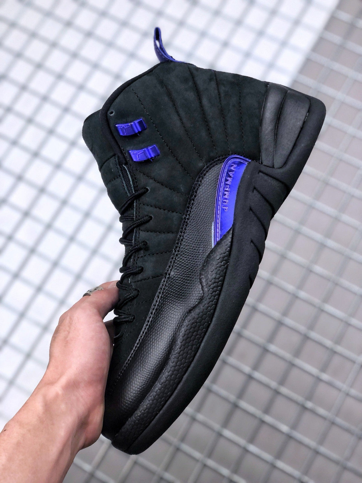 Air Jordan 12 Dark Concord Sneakers CT8013-005 - product image from the listing.