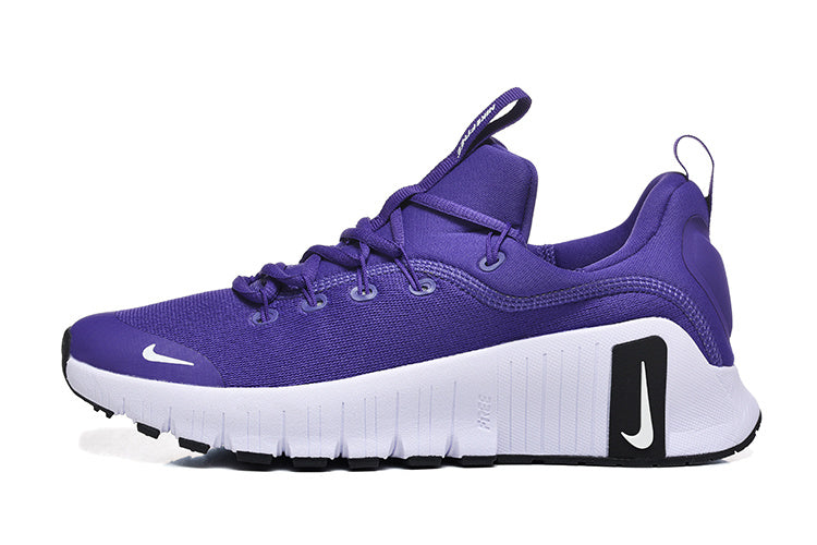 Nike Free Low-Top Sneakers in Purple - product image from the listing.