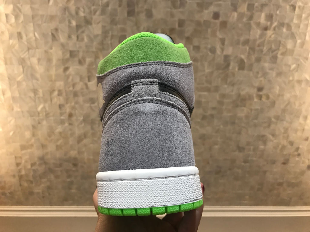 Jordan 1 Retro High OG High-Top Sneakers in Grey Green - product image from the listing.