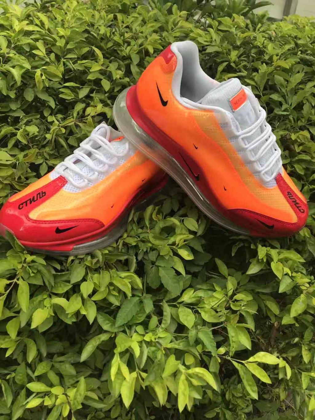 Orange and Red Nike Air Max 720 Sneakers - product image from the listing.