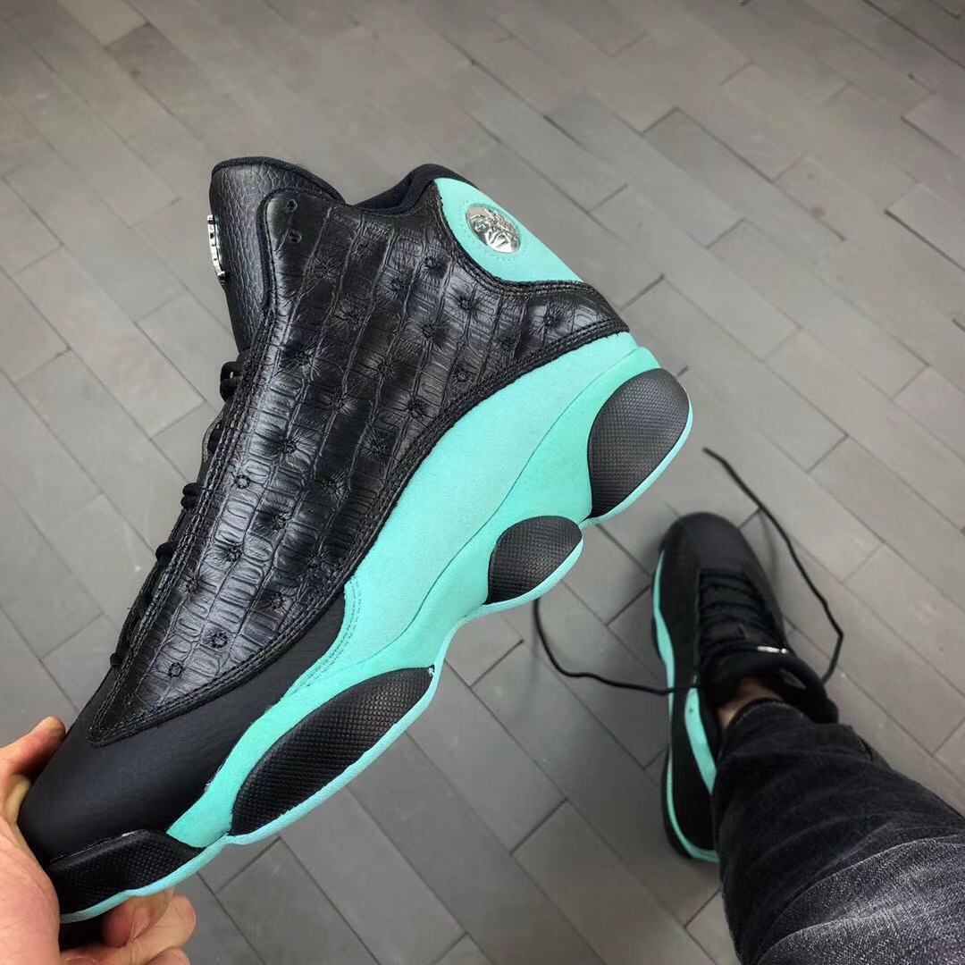 Air Jordan 13 Island Green Sneakers in Black Turquoise - product image from the listing.