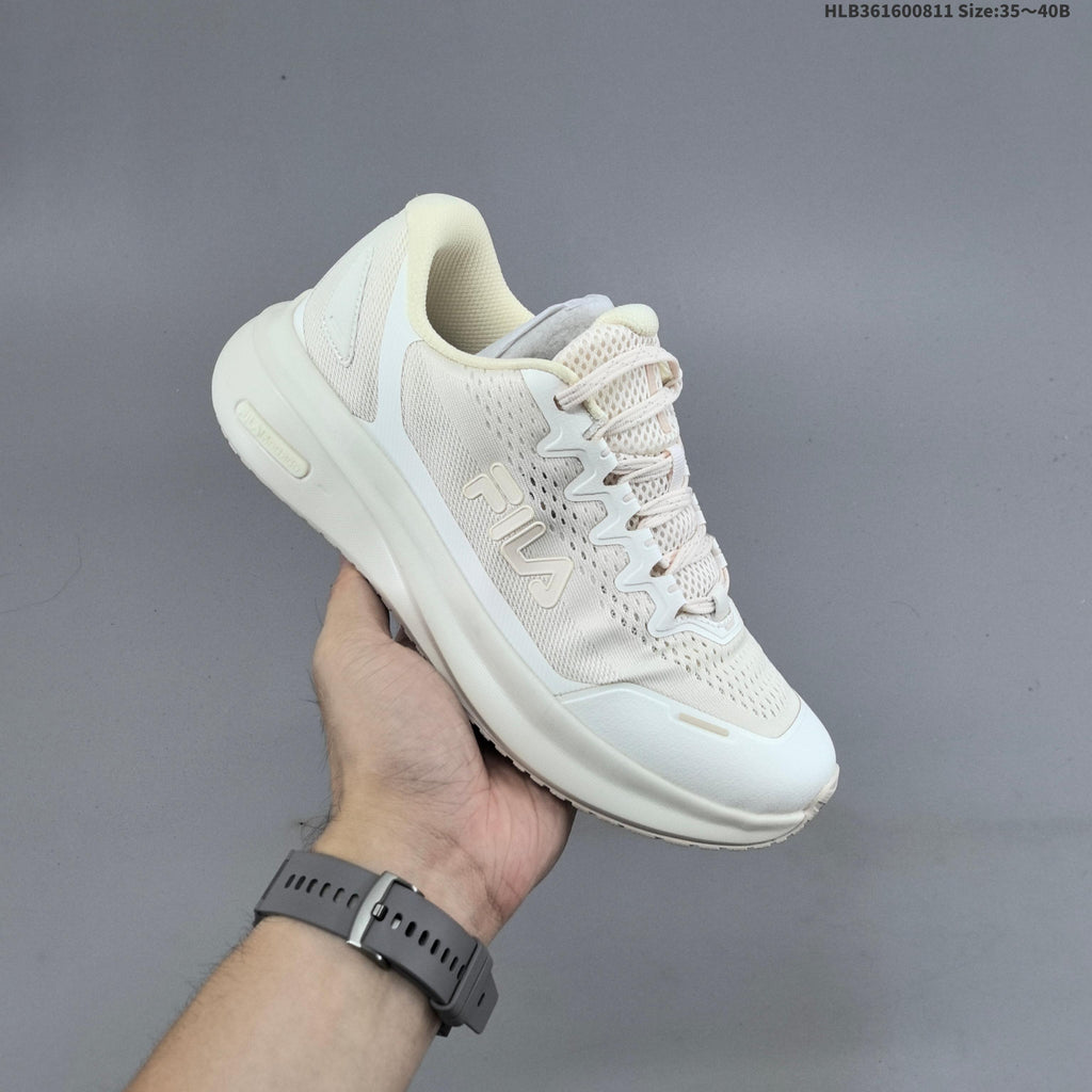 Ivory FILA Pebble Sandal Sneakers - product image from the listing.