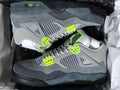Jordan 4 Retro Sneakers in Gray Green - product image from the listing.