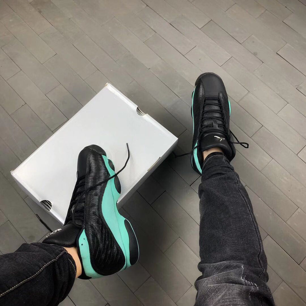 Air Jordan 13 Island Green Sneakers in Black Turquoise - product image from the listing.