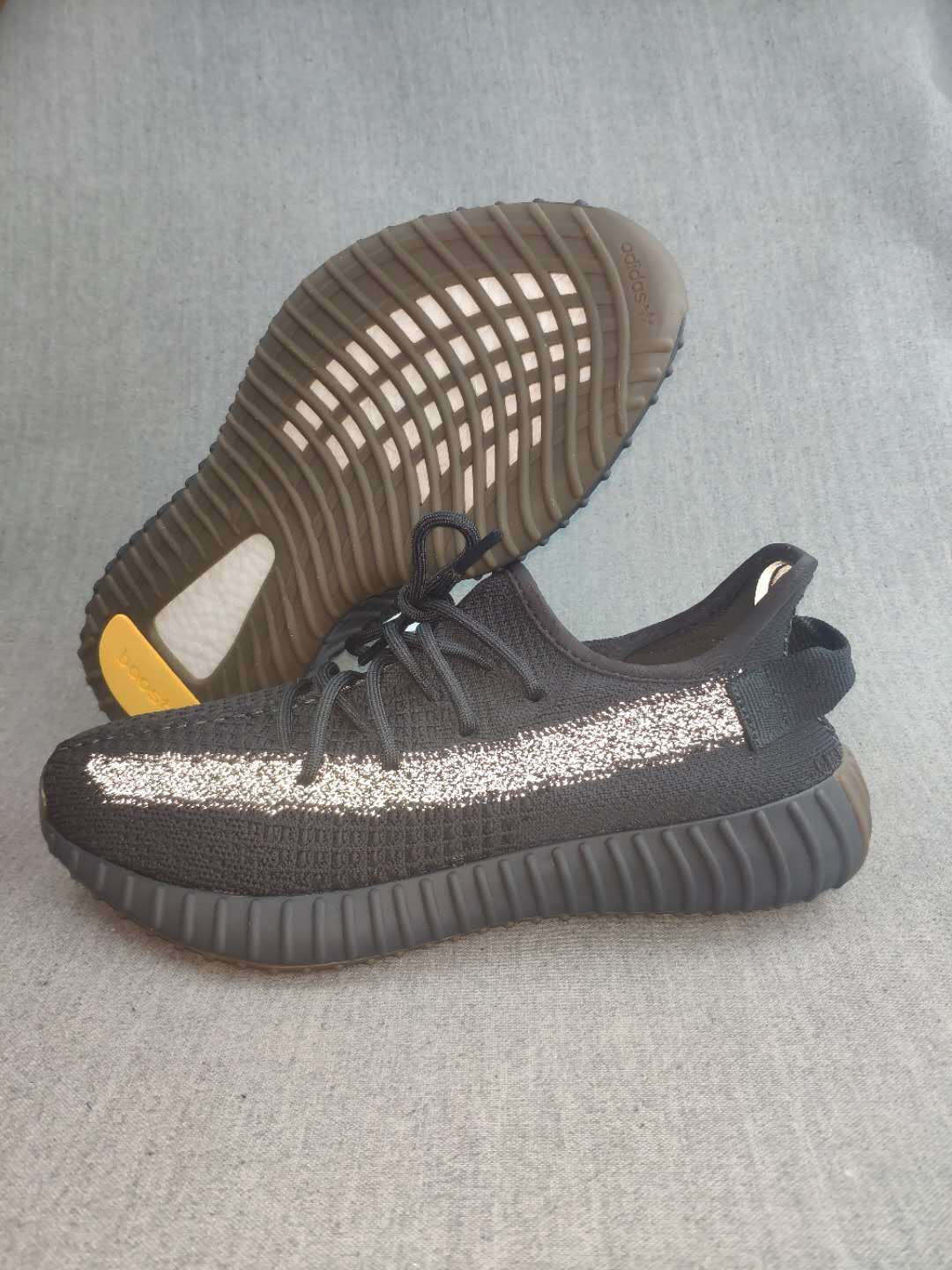 Yeezy Boost 350 V2 Reflective Sneakers in Black - product image from the listing.