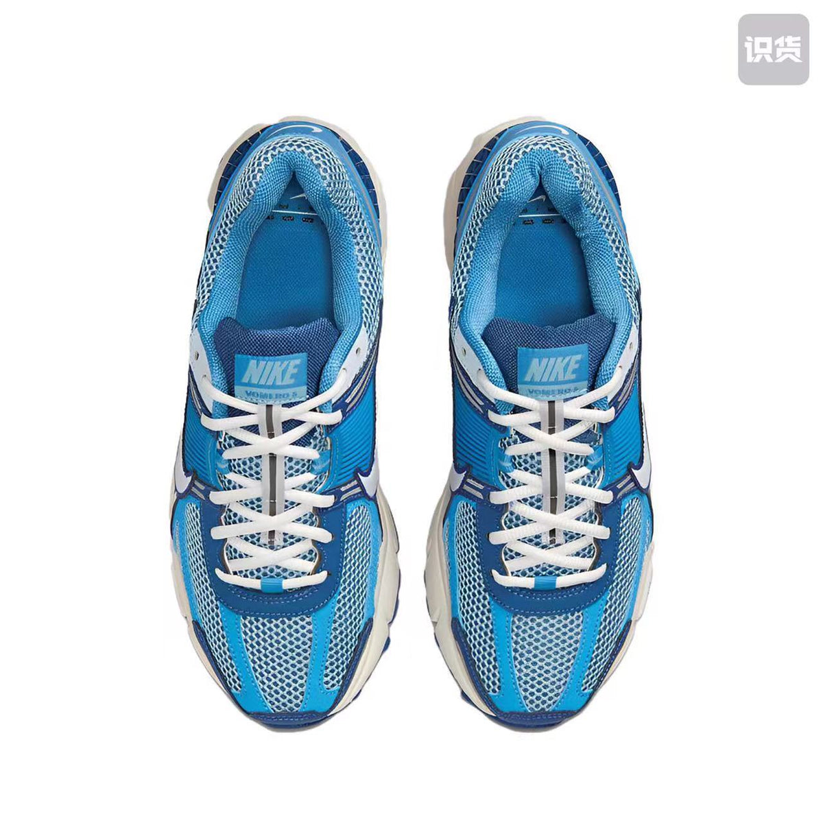 Nike Zoom Vomero 5 Sneakers in White Blue Silver - product image from the listing.
