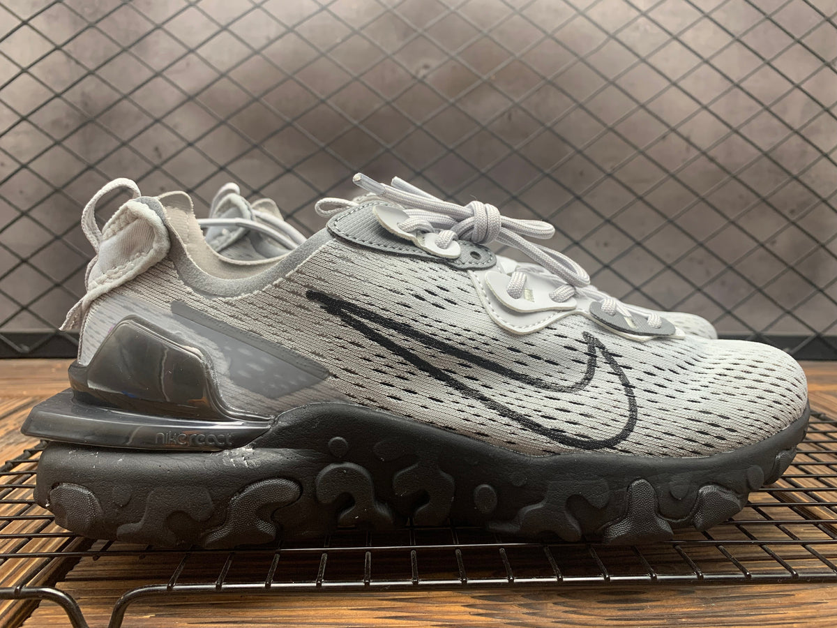 Black and Grey Nike React Vision Sneakers - product image from the listing.