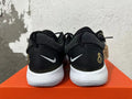 Nike Zoom Basketball Shoes in Black and Gold - product image from the listing.