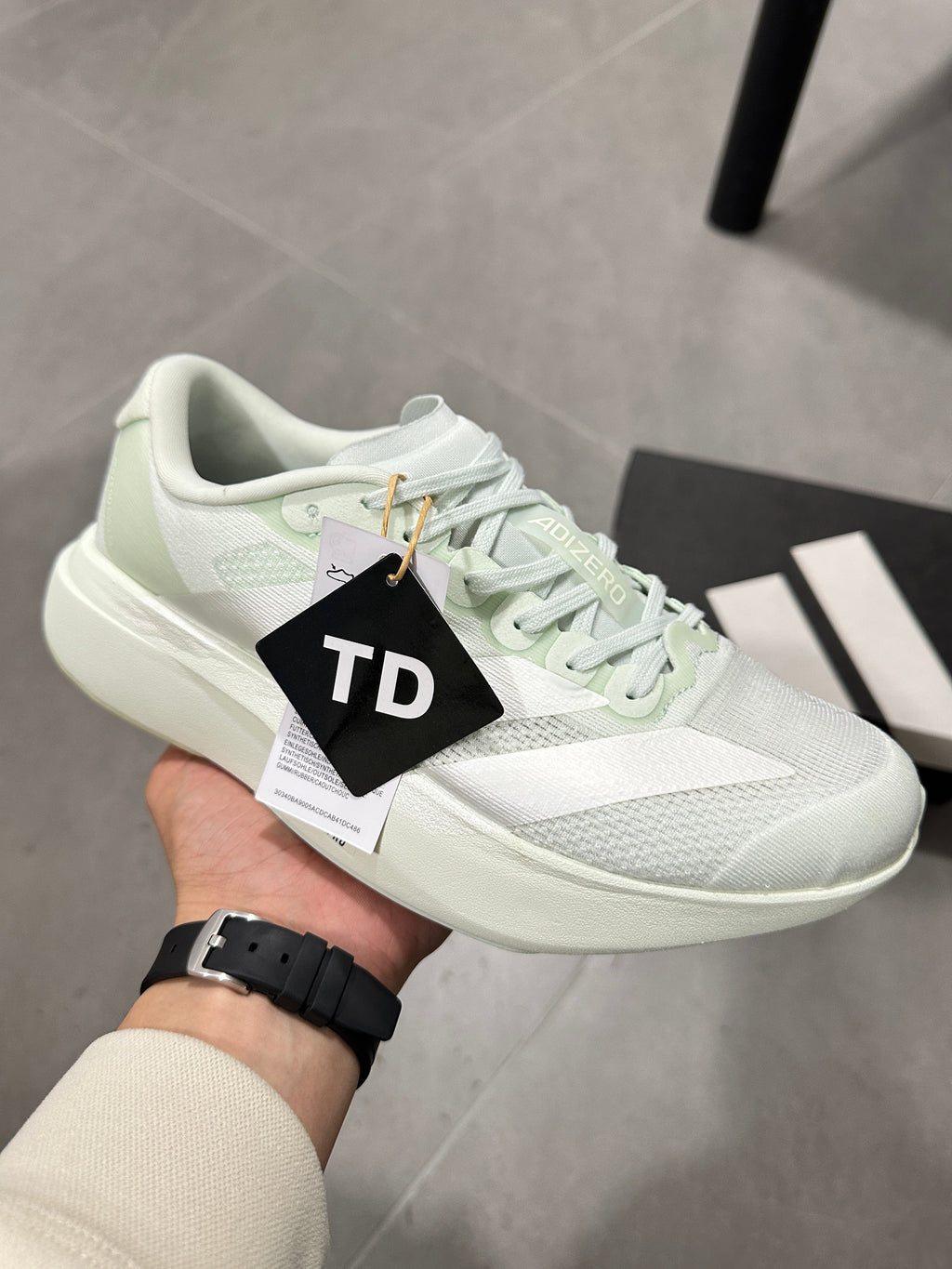 adidas Lightstrike Pro Running Shoes in White Green JR5840 - product image from the listing.