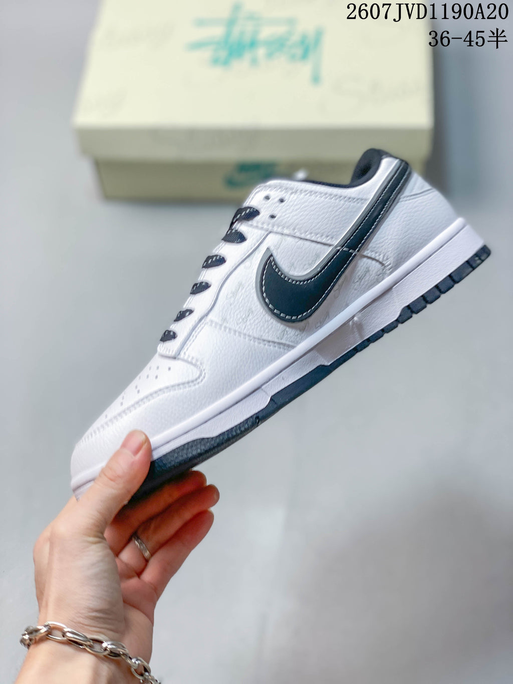 Nike SB Dunk Low Stüssy Sneakers in White Black - product image from the listing.