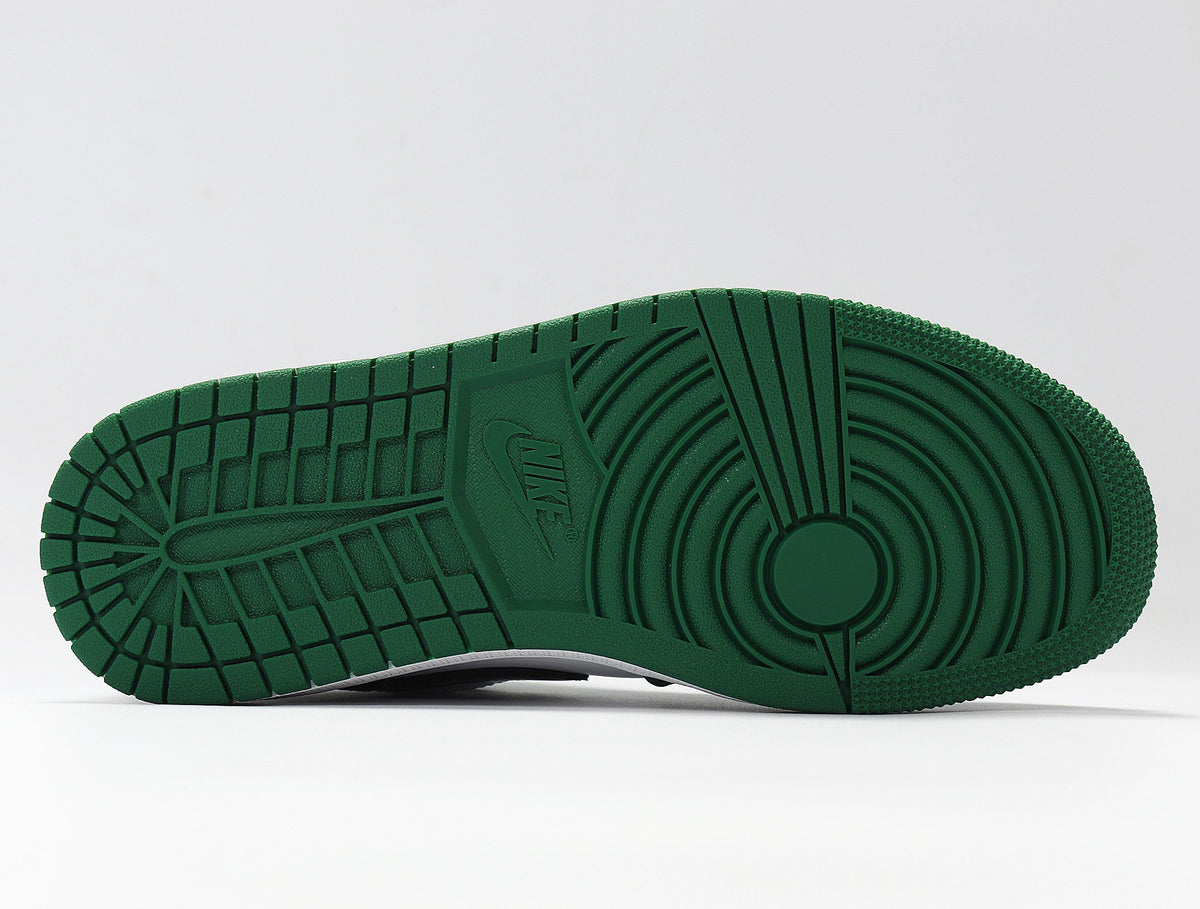 Jordan 1 Low Sneakers in White and Green 553558-301 - product image from the listing.