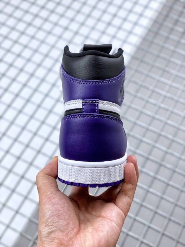 Air Jordan 1 High OG Court Sneakers in Purple 555088-500 - product image from the listing.