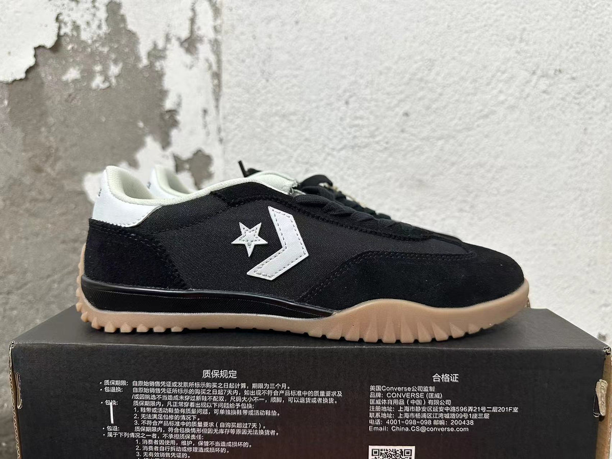 Black and White Converse Trainer-Style Sneakers - product image from the listing.