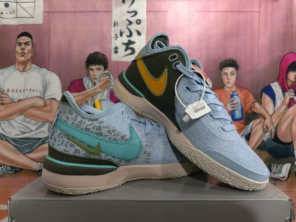 Light Blue and Teal Nike Basketball Shoes - product image from the listing.