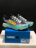 HOKA Speedgoat 6 Trail Running Shoes, in Gray and Teal - product image from the listing.