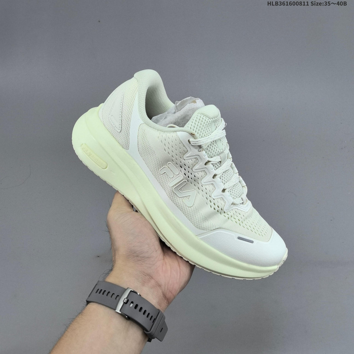 Ivory FILA Pebble Sandal Sneakers - product image from the listing.