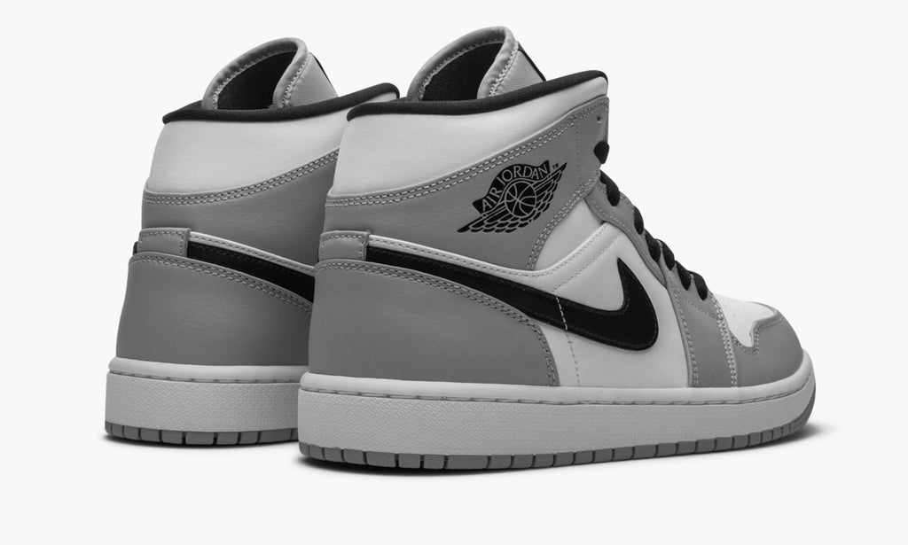 Air Jordan 1 Mid in Light Smoke Grey - product image from the listing.