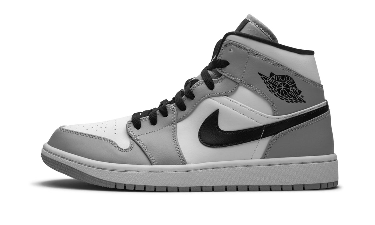 Air Jordan 1 Mid in Light Smoke Grey - product image from the listing.