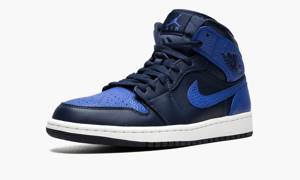Air Jordan 1 Mid Obsidian in Royal - product image from the listing.