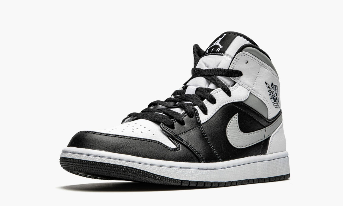 White Shadow - Air Jordan 1 Mid - product image from the listing.