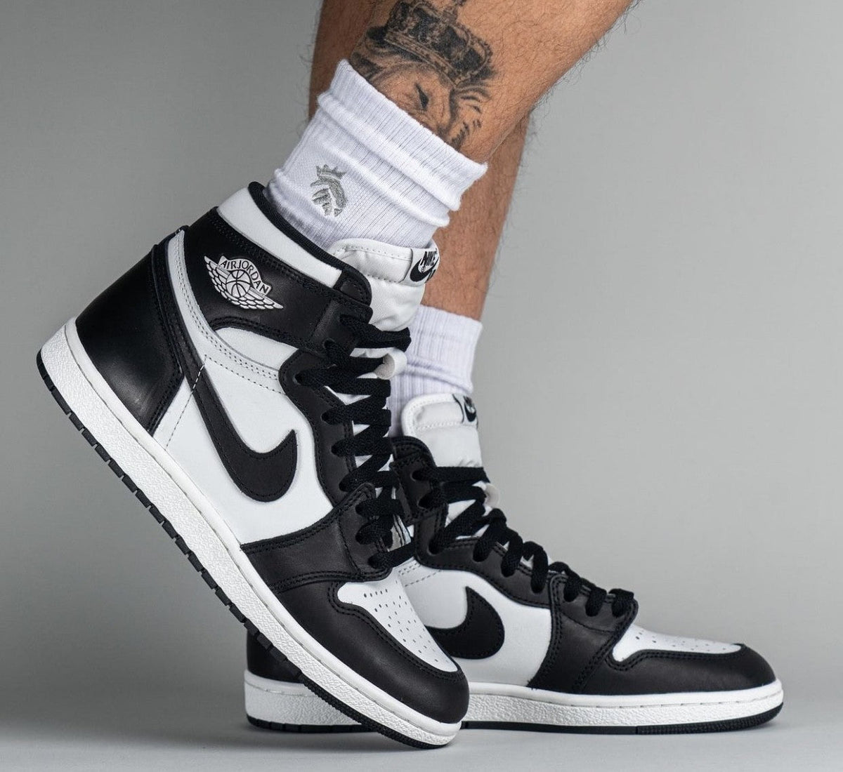 85 Black White - Air Jordan 1 Retro High 2023 - product image from the listing.